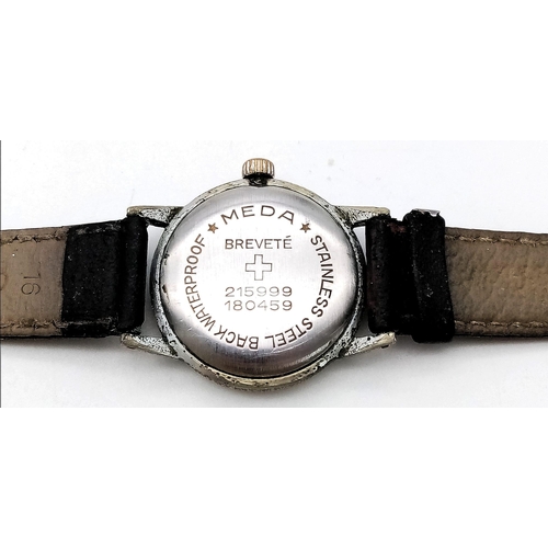 456 - A 1940s Swiss Meda Military Watch. Case - 30mm. Black dial with second sub dial. Mechanical movement... 