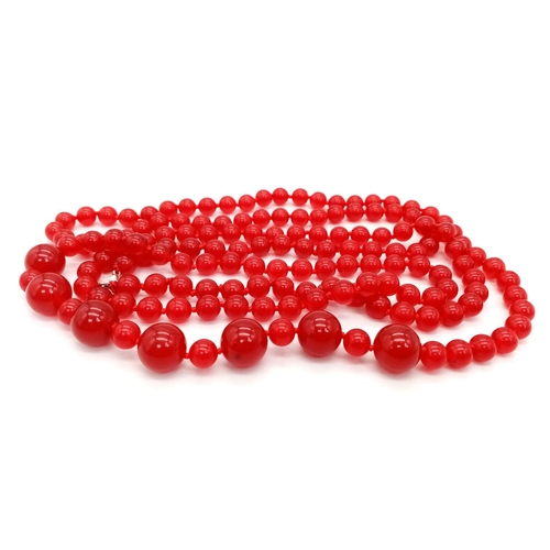 817 - A Rope Length Red Jade Necklace with Different Sized Jade Beads - 8mm and 14mm. Necklace length - 14... 