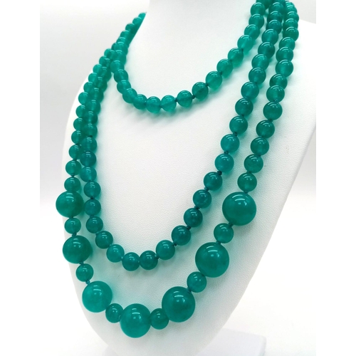 894 - A Light Blue Jade Rope Necklace with Jade Beads Ranging from 8mm to 14mm. Can be worn in different s... 