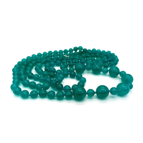 894 - A Light Blue Jade Rope Necklace with Jade Beads Ranging from 8mm to 14mm. Can be worn in different s... 