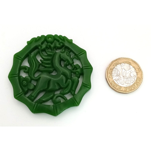 996 - A Green Jade Circular Horse Decorative Pendant. 5cm diameter. Pierced design.