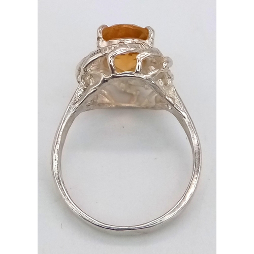 1052 - A 925 Silver and Oval Citrine Stone Ring. Size I/J.