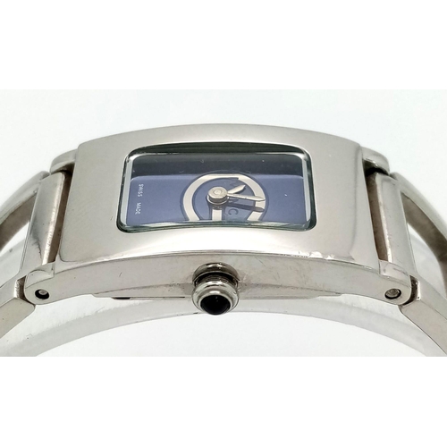 127 - A polished, stainless steel, ladies GIVENCHY-Paris watch, rectangular case 26 x 17 mm, dark blue dia... 