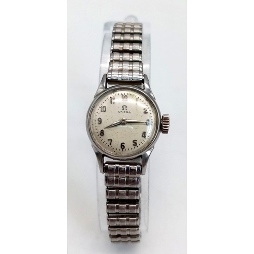 344 - A Vintage (1950s) Omega Ladies Watch. Expandable bracelet. Steel case - 20mm. Mechanical movement in... 