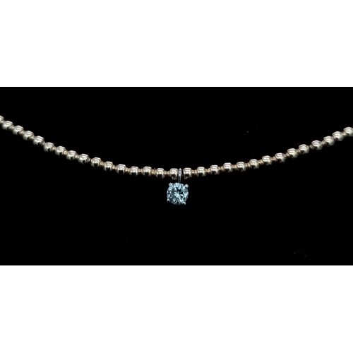 934 - A 14K Yellow Gold Small Bead Necklace with White Stone Diamond Decoration - 0.07ct.  1.5g total weig... 