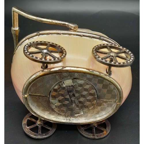 232 - A vintage, baby pram moneybox with over hundred halfpenny coins (various dates) inside. These coins ... 