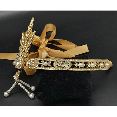 272 - A symbol of 30s “good times”, ART DECO tiara. Gilded with Austrian crystals complete with ribon.