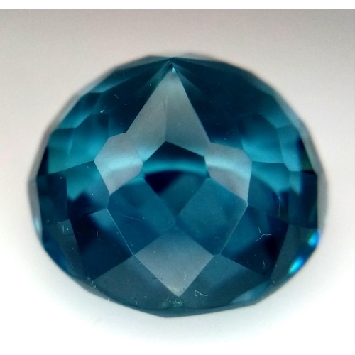 426 - A Beautiful 37ct Round Cut Faceted Aqua Marine Gemstone. Trillion faceted cut base. No visible marks... 