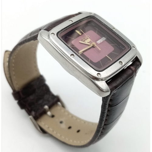 965 - A Vintage Seiko 5 Automatic Gents Watch. Burgundy leather strap. Tank case - 29mm width. Two tone di... 