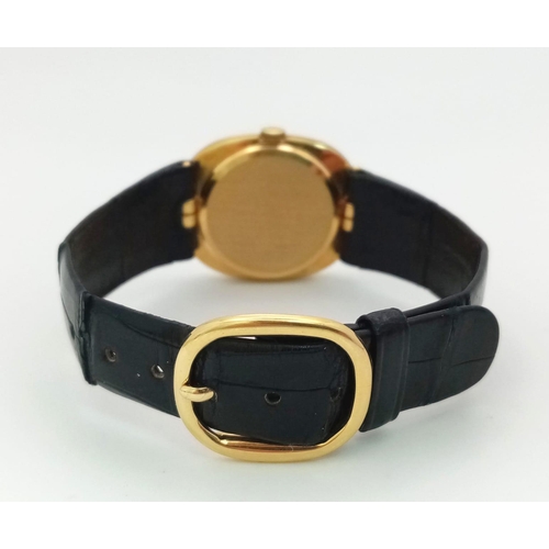 65 - A Vintage Patek Phillipe 18K Gold Gents Watch. Original black leather strap with 18k gold buckle. 18... 