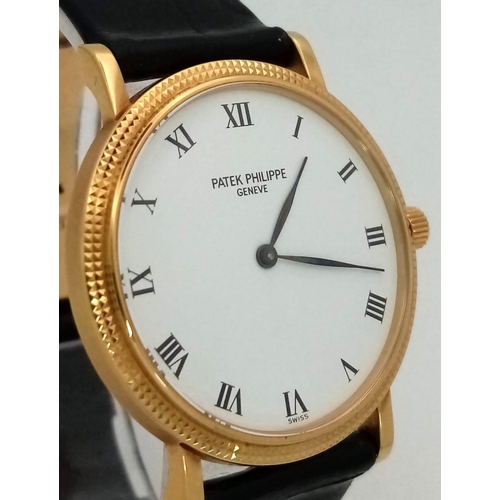 653 - An Understated 18K Gold Patek Phillipe Calatrava Gents Watch. Black crocodile strap with gold clasp.... 