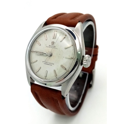 674 - A Vintage Automatic Rolex Oyster Perpetual Gents Watch. Brown leather strap. Stainless steel case - ... 