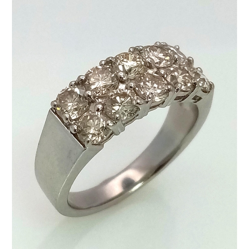 493 - A Platinum and Halo Set Diamond Ring. 2.08ct Diamond. Total weight 8.8g. Size O.