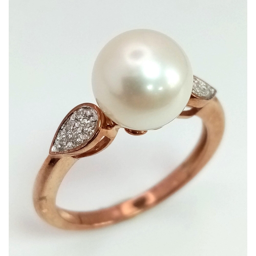 1114 - A 9K rose gold cultured pearl and diamond ring. Round cut diamonds - 0.10ct. Size N. 3.03g total wei... 