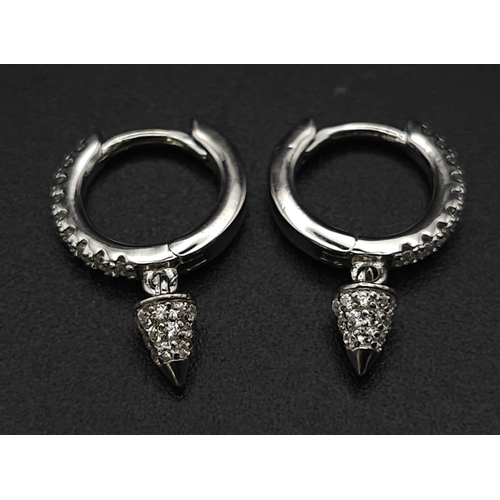 1135 - A pair of silver half hoop earrings set with CZ and hanging pendants. Ref: 7086