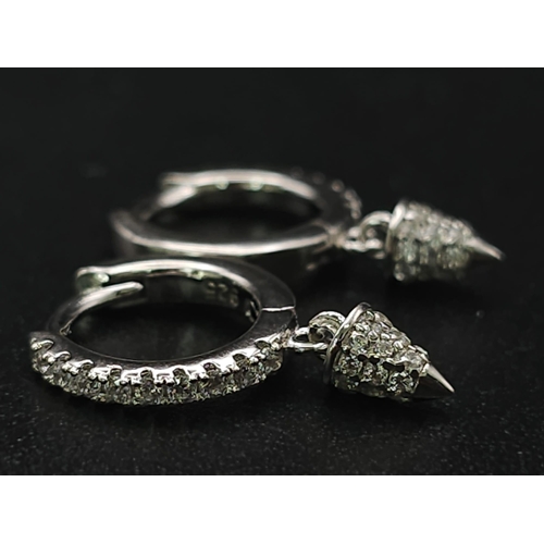 1135 - A pair of silver half hoop earrings set with CZ and hanging pendants. Ref: 7086