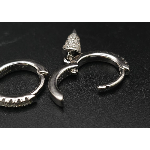 1135 - A pair of silver half hoop earrings set with CZ and hanging pendants. Ref: 7086