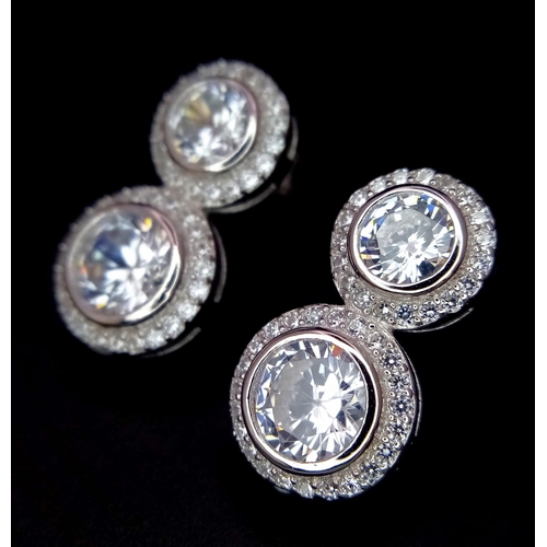 1156 - A Pair of Silver Double Drop CZ Halo Earrings. Ref: 6974