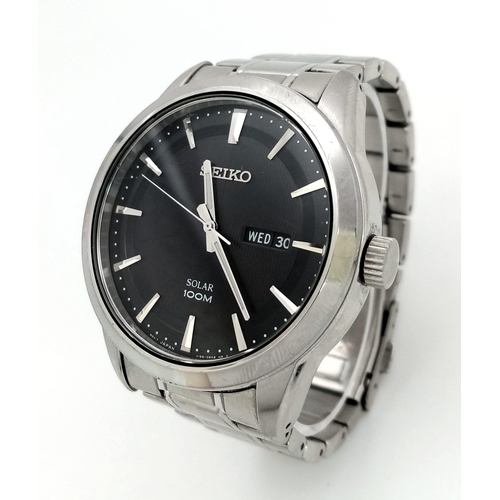 1136 - A gents SEIKO, solar powered, dress watch, 42 mm case, black dial with date/day window, “Hardlex” gl... 