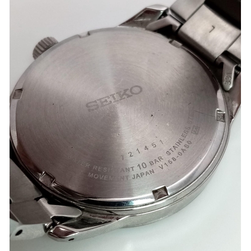 1136 - A gents SEIKO, solar powered, dress watch, 42 mm case, black dial with date/day window, “Hardlex” gl... 