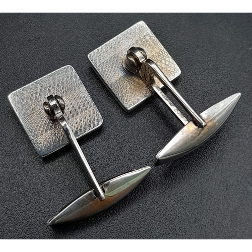 1140 - Set of elegant sterling silver cufflinks. Wt 9.5g.