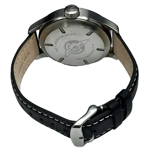 1157 - A Ducati Gents Quartz Watch. Black leather strap. Stainless steel case - 47mm. White dial with date ... 