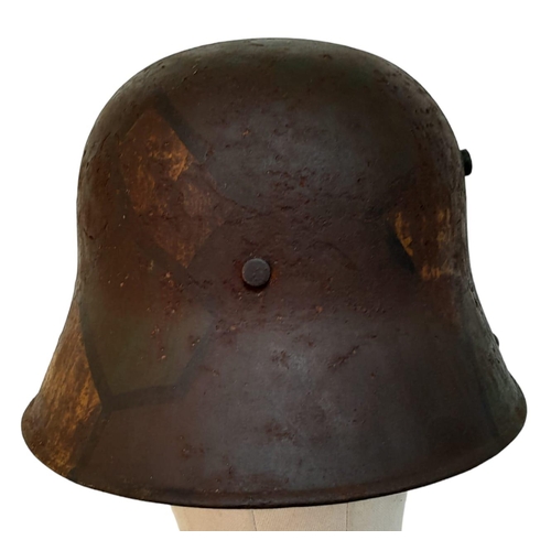 131 - A WW1 Imperial German M17 Jigsaw pattern camouflage Stahlhelm with liner.