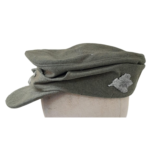 187 - A WW2 German Heer (Army) M43 Cap with Jäger (light infantry mountain troops) Insignia.