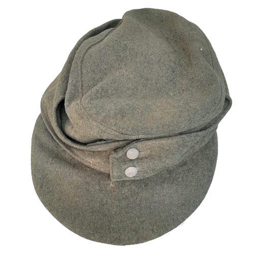 187 - A WW2 German Heer (Army) M43 Cap with Jäger (light infantry mountain troops) Insignia.