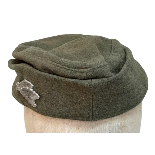 187 - A WW2 German Heer (Army) M43 Cap with Jäger (light infantry mountain troops) Insignia.