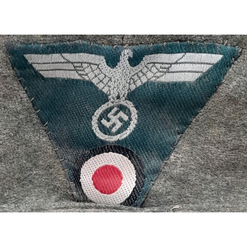 187 - A WW2 German Heer (Army) M43 Cap with Jäger (light infantry mountain troops) Insignia.