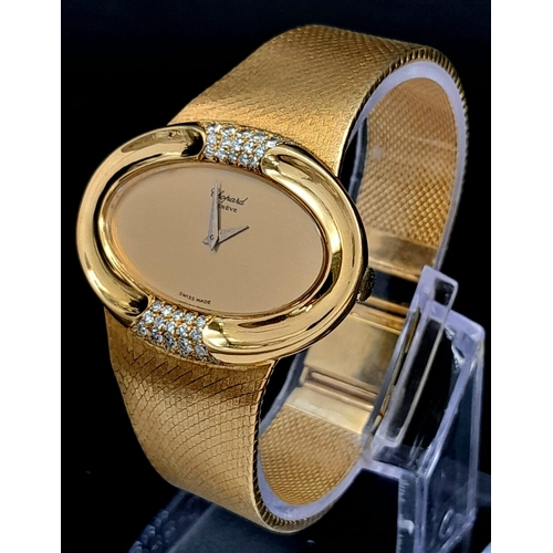 667 - An 18k Yellow Gold and Diamond Chopard Women's Dress Watch. Mechanical movement. 18k gold bracelet a... 