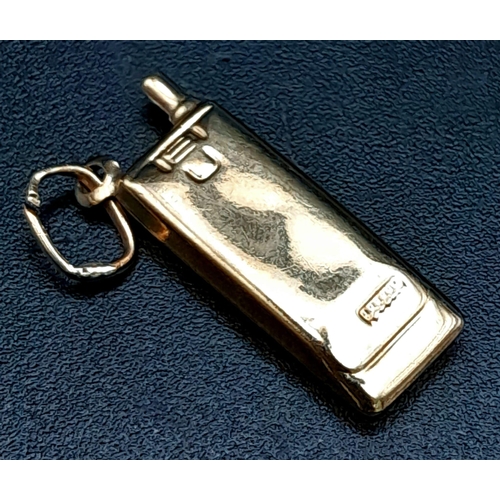 930 - A 9K Yellow Gold Mobile Phone Charm. 0.8g total weight.