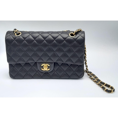Lot 13 - A Chanel black quilted lambskin leather bag