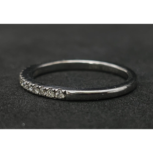 195 - 18K WHITE GOLD 0.23CT DIAMOND BAND RING 