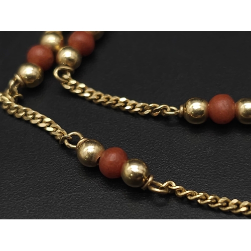 398 - 9kt Yellow Gold Coral Set Necklace.
W: 5.1g
L: 37cm