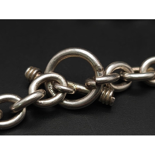 533 - A Sterling silver chunky belcher chain with oval ID tag and t-bar fastening. 57.9g weight. 42cm.