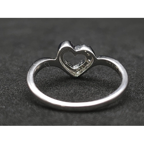 559 - 18K WHITE GOLD DIAMOND SET OPEN HEART RING. TOTAL WEIGHT 2.6G. SIZE L 1/2