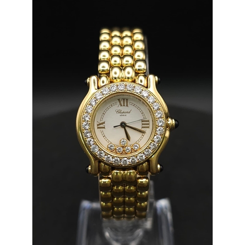 618 - A Chopard Happy Sport 18K Solid Gold and Diamond Ladies Watch. 18k gold bracelet and case - 26mm. Di... 