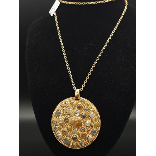 639 - A Theodores 18K Rose Gold and Diamond Circular Pendant on an 18K Rose Gold Chain. 16ctw of rough cut... 