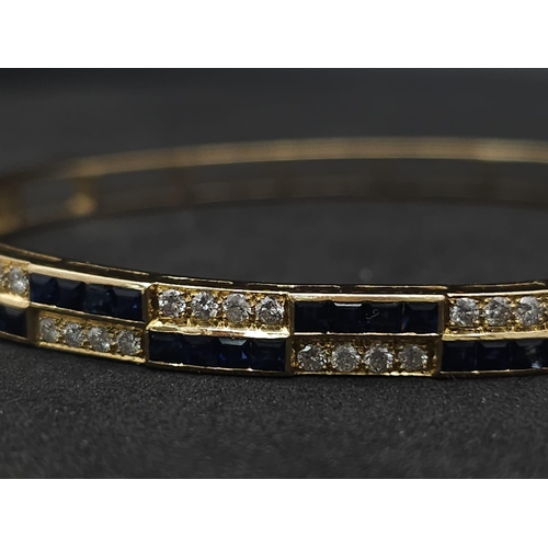 76 - An18kt Yellow Gold Diamond & Sapphire Bangle.0.50ct Diamonds 0.65ct Sapphires 
W: 13.7g