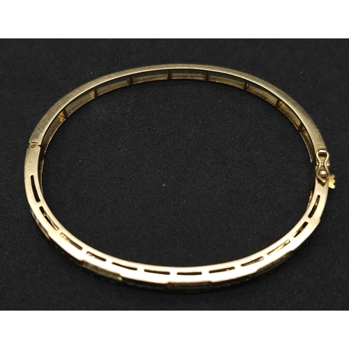 76 - An18kt Yellow Gold Diamond & Sapphire Bangle.0.50ct Diamonds 0.65ct Sapphires 
W: 13.7g