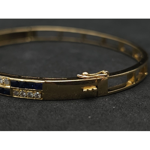 76 - An18kt Yellow Gold Diamond & Sapphire Bangle.0.50ct Diamonds 0.65ct Sapphires 
W: 13.7g