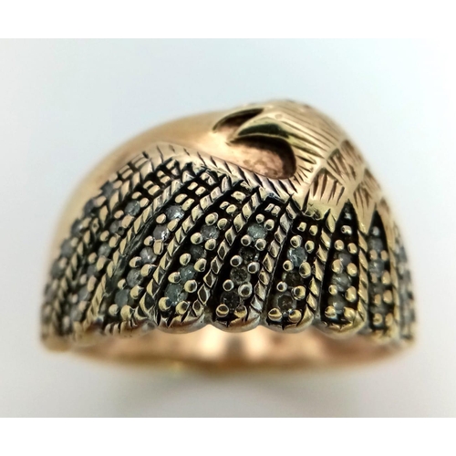 264 - 9kt Yellow Gold Diamond Set Eagle Ring.
W: 6.5g
Size R