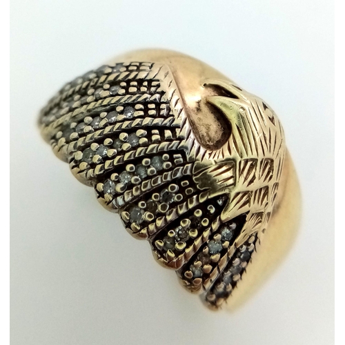 264 - 9kt Yellow Gold Diamond Set Eagle Ring.
W: 6.5g
Size R