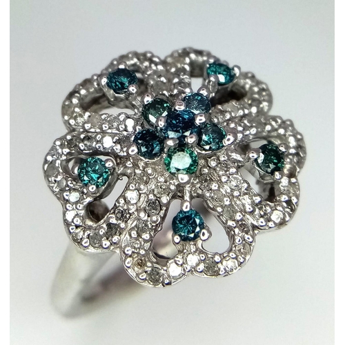 271 - 10K WHITE GOLD DIAMOND SET FANCY RING FLORAL DESIGN, WEIGHT 6G SIZE N