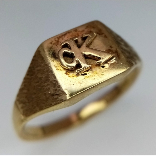 459 - 9kt Yellow Gold CK Calvin Klein Signet Ring.
3.9g
Size U