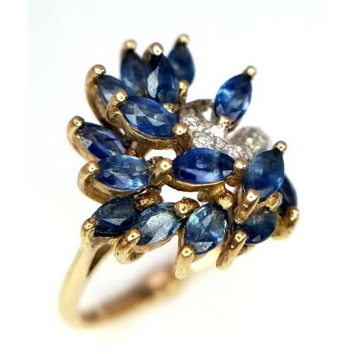 602 - 9kt Yellow Gold Diamond & Sapphire Ring.
W: 3.2g
Size K