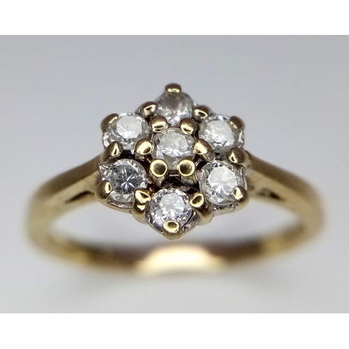 678 - 9K yellow gold diamond cluster ring. 0.25ct. Wt 1.9g. Size I/J.