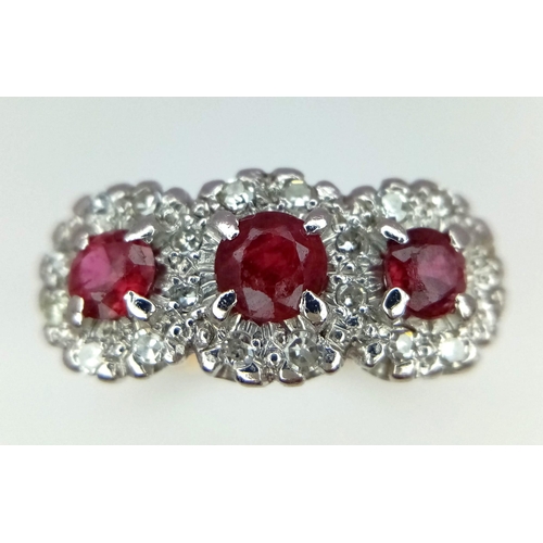 90 - 18K YELLOW AND WHITE GOLD DIAMOND & RUBY TRIPLE CLUSTER RING, WITH TRILOGY RUBY SETTING AND DIAMONDS... 